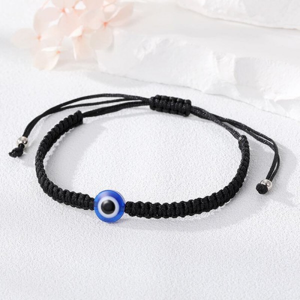 Black bracelet with an eye - Turkish Nazar bead.