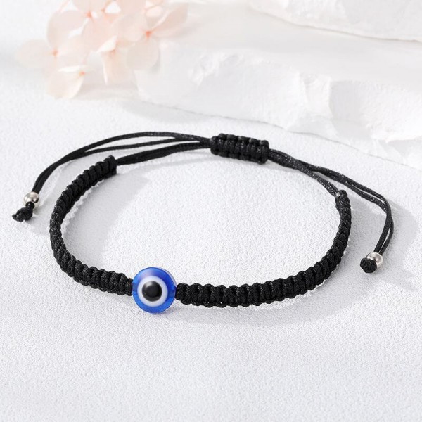 Black bracelet with an eye - Turkish Nazar bead.