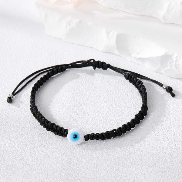 Black bracelet with an eye - Turkish Nazar bead.